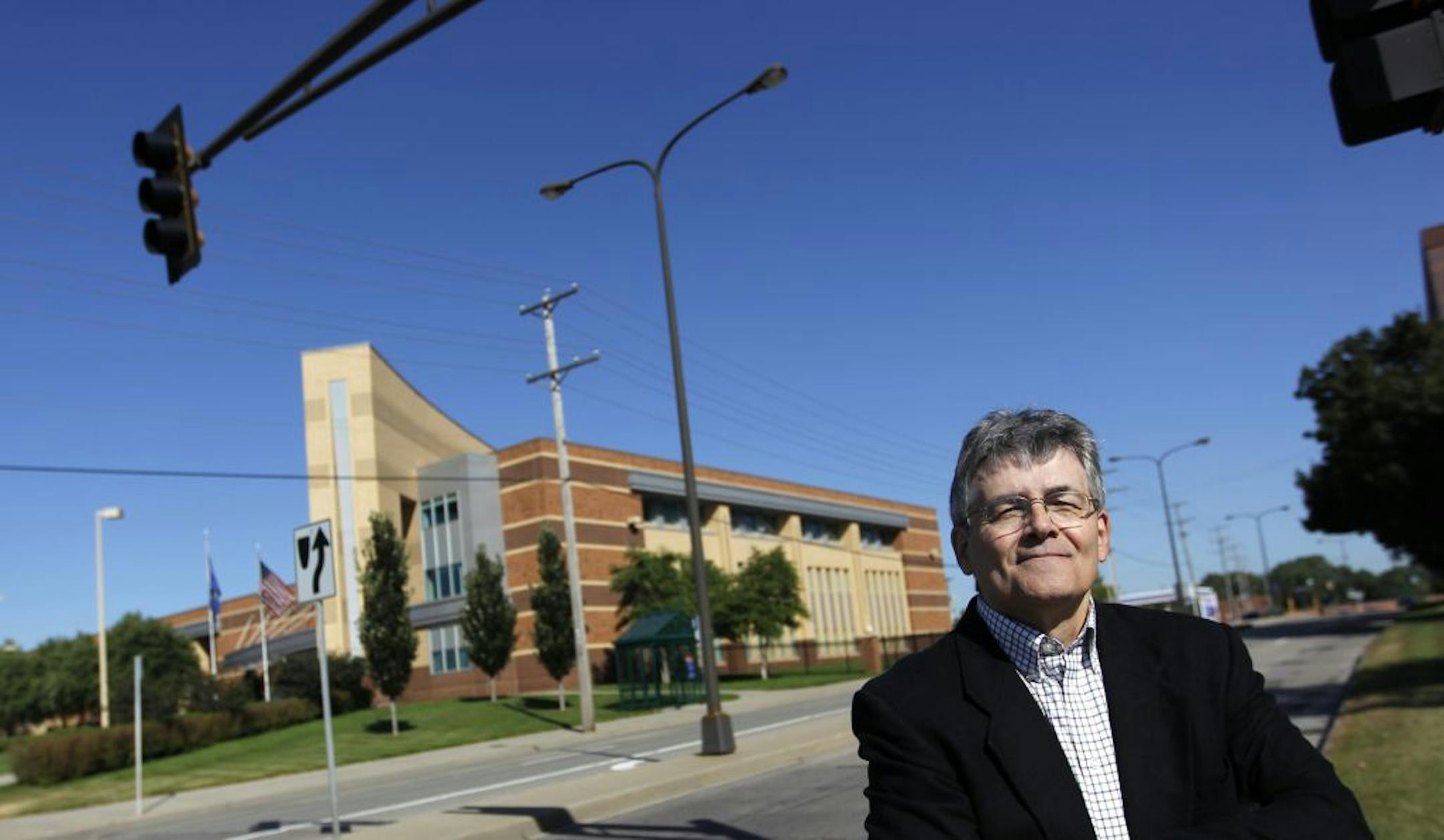 Cover story on Larry Millett's new book about lost mansions of the Twin Cities ("Once There were Castles.") Larry, in the streets of Lower Town St. Paul, Lafayette Rd./Grove St. where the mansions once stood.