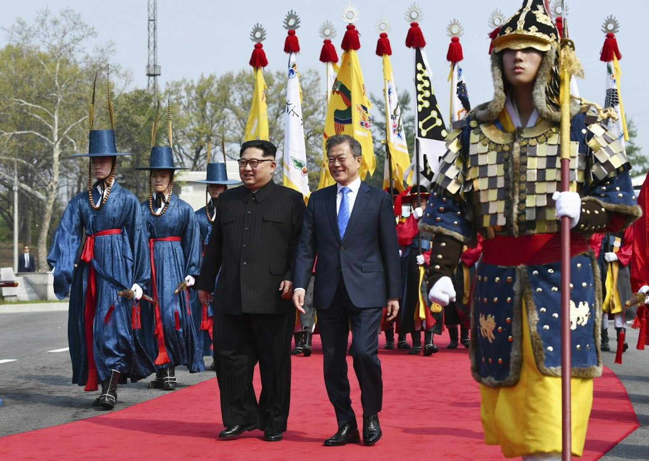 North Korean leader Kim Jong Un, left, and South Korean President Moon Jae-in walk together at the border village of Panmunjom in the Demilitarized Zone Friday, April 27, 2018. Kim made history Friday by crossing over the world's most heavily armed border to greet his rival, Moon, for talks on North Korea's nuclear weapons.
