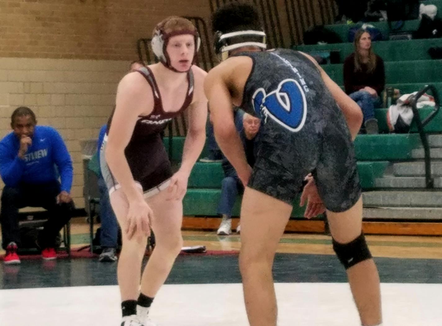 Scott Springer (left), wrestling for Anoka at 132 pounds, won five consecutive matches last week to improve to 26-5 on the season.