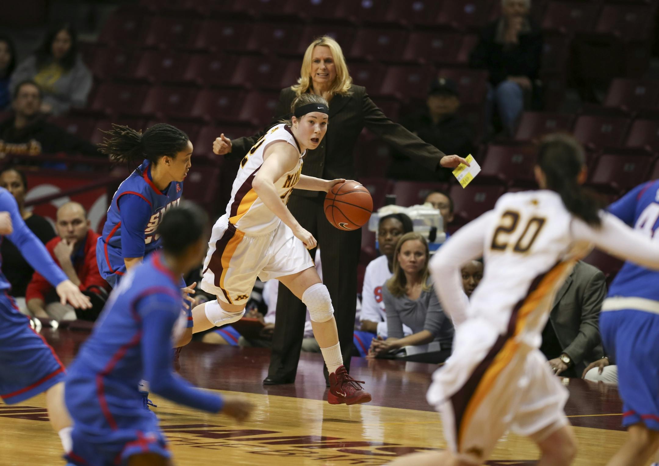 Gophers guard Joanna Hedstrom (22) moved the ball up the sidelines late in the game.