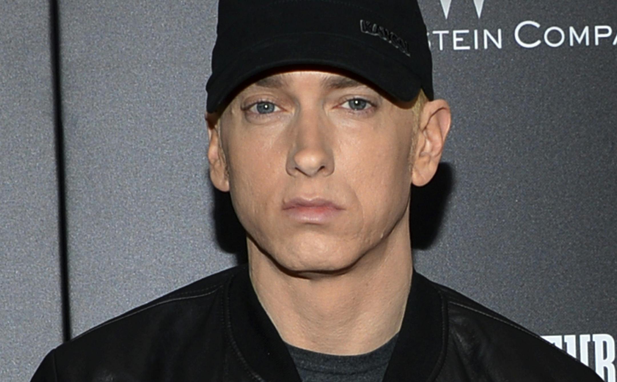 FILE - In this July 20, 2015, file photo, rapper Eminem attends the premiere of "Southpaw" in New York. Rapper Eminem once again dropped a surprise album, releasing “Music to be Murdered By” on Friday, Jan. 17, 2020. (Photo by Evan Agostini/Invision/AP, File)