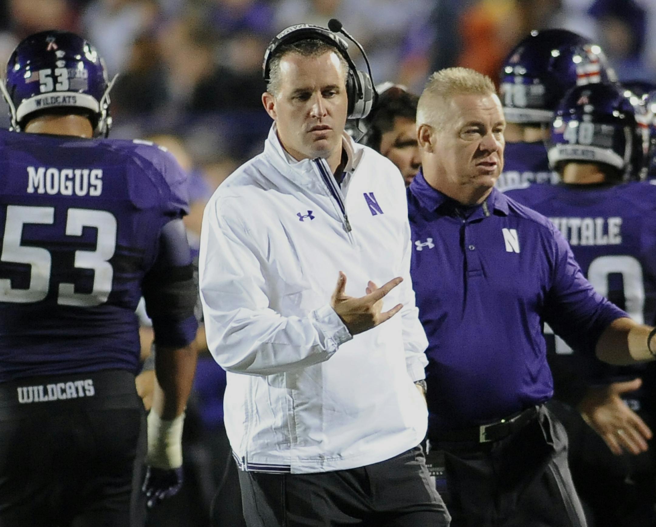 Northwestern head coach Pat Fitzgerald looks on against Western Michigan during an NCAA college football game in Evanston, Ill., Saturday, Sept. 14, 2013. (AP Photo/Matt Marton) ORG XMIT: MIN2013100318524688