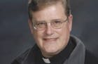 In this photo provided by the Catholic Diocese of Arlington, Va., Father William Aitcheson, a priest in the Roman Catholic Diocese of Arlington. Aitch