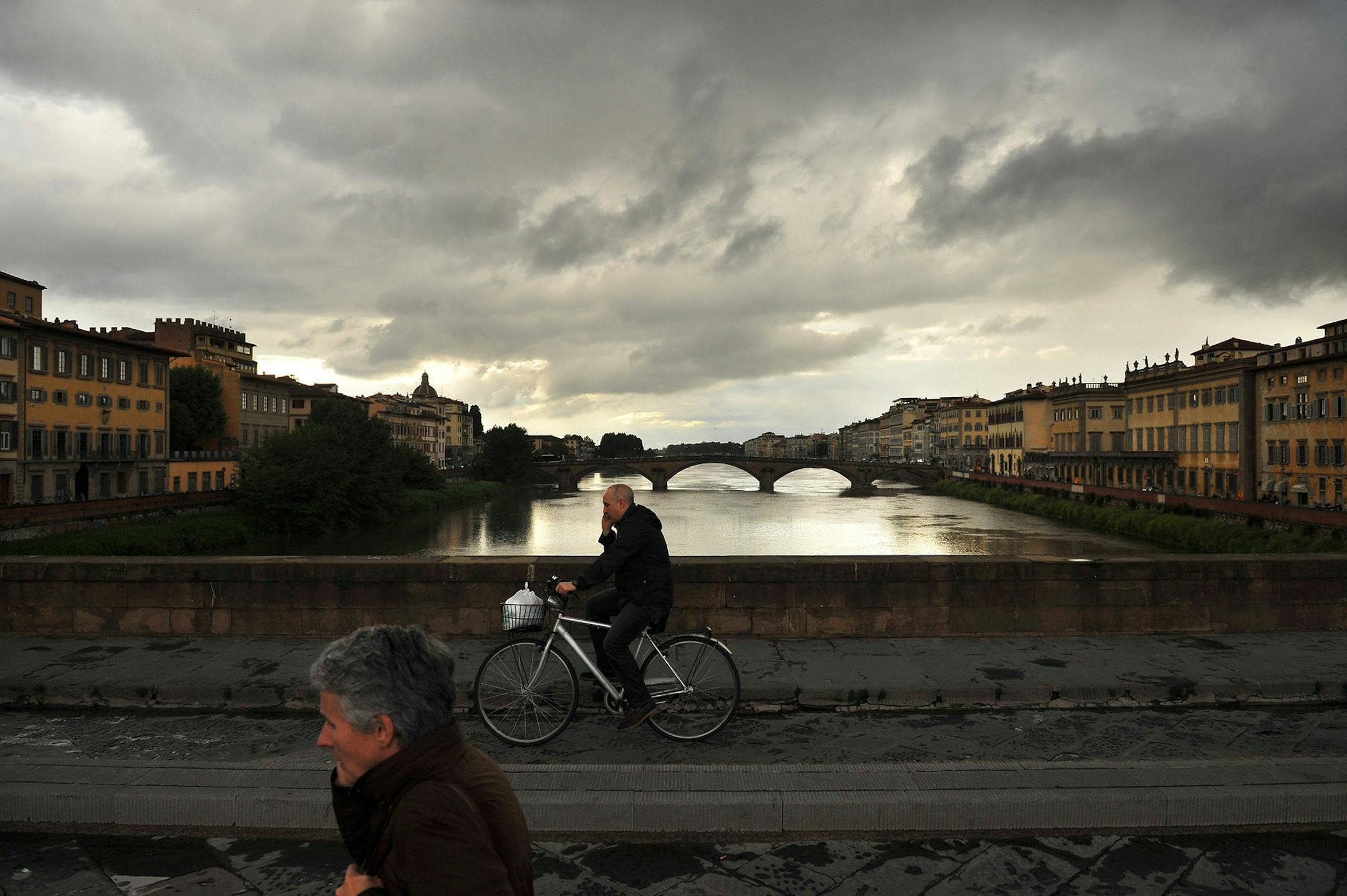 People make their way along the Ponte Santa Trinita on May 16 in Florence, Italy. Florence was a major center for art during the Renaissance. Illustrates TRAVEL-FLORENCE (category t), by Margo Hammond, special to The Washington Post. Moved Tuesday, August 6, 2013. (MUST CREDIT: Photo by Matt McClain for the Washington Post)