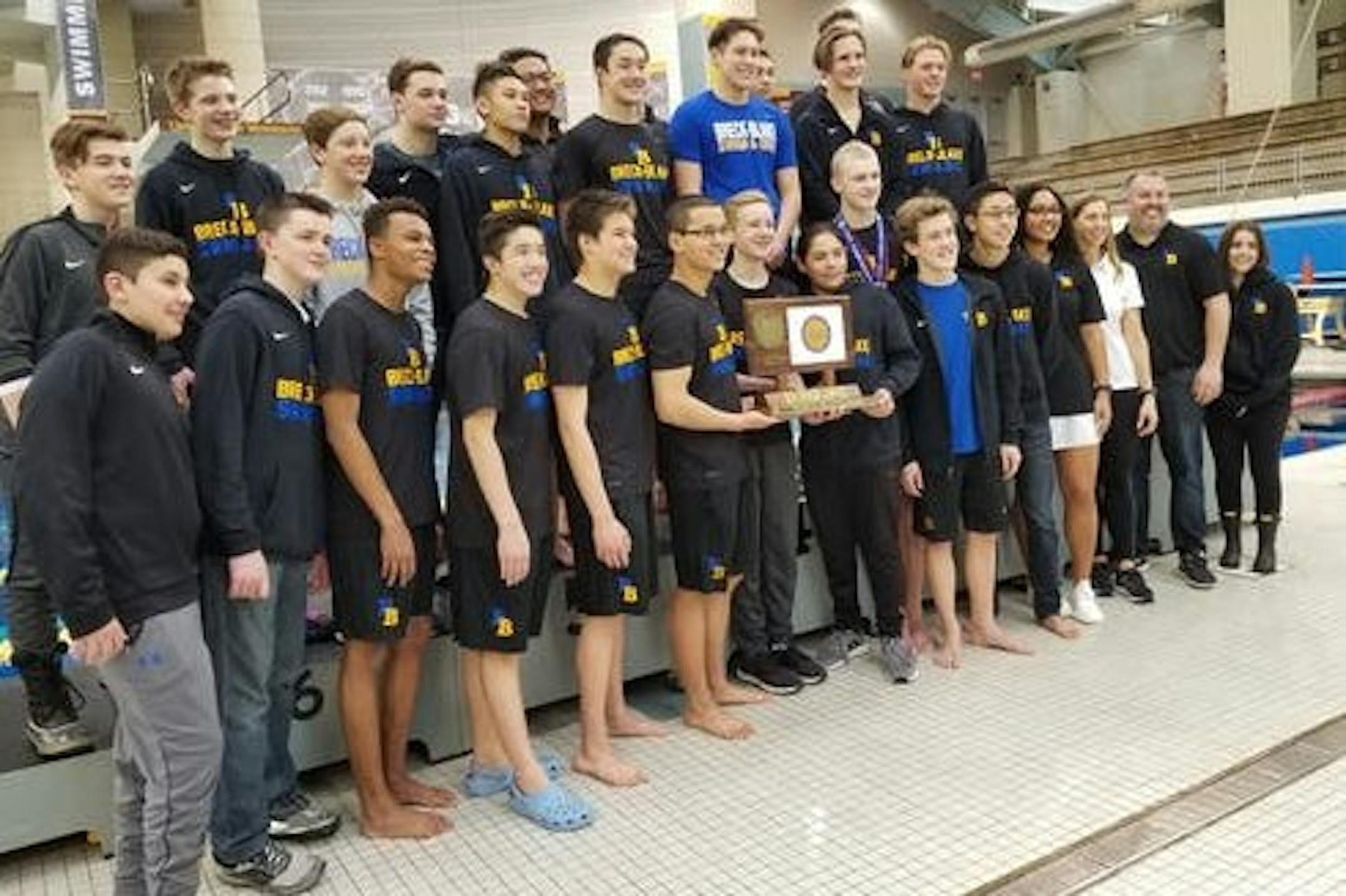 Breck/Blake team members posed with their trophy after winning the Class 1A boys' swimming and diving team championship Saturday.