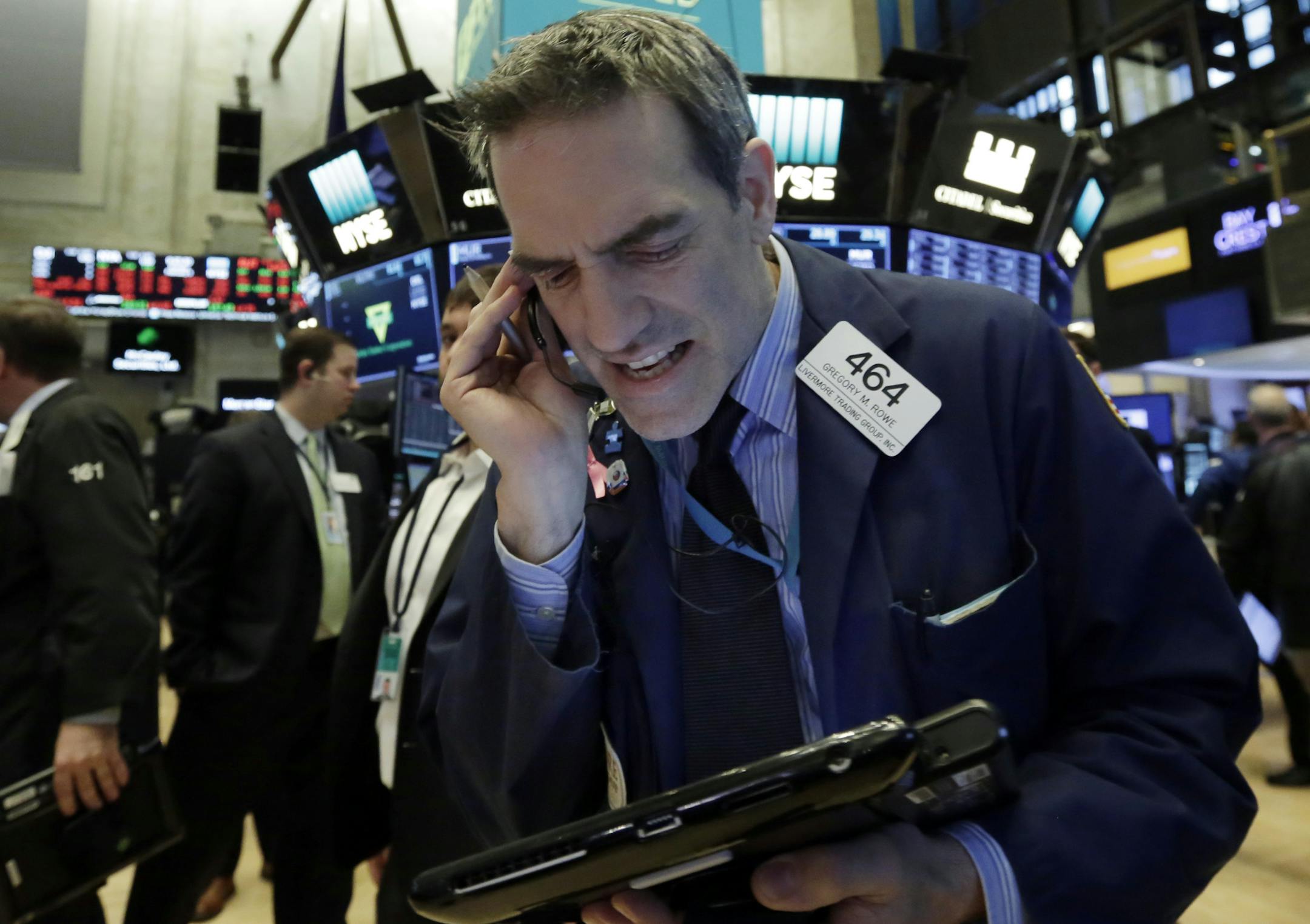 Trader Gregory Rowe works on the floor of the New York Stock Exchange, Monday, Feb. 5, 2018. Stock markets around the world took another pummeling Monday as investors continued to fret over rising U.S. bond yields. (AP Photo/Richard Drew)