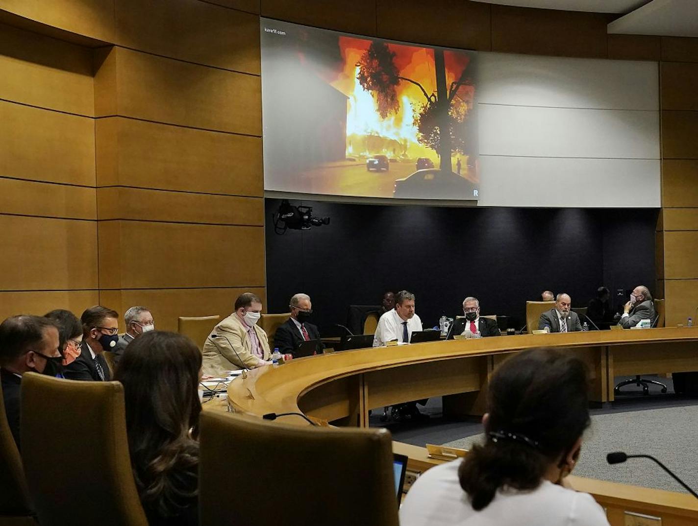 Minnesota Senate Republicans held the first in a series of hearing looking into damage to Twin Cities businesses in the wake of the unrest related to the killing of George Floyd during the initial hearing at the Senate Building in St. Paul, Wednesday. Here, committee members watched a video recap of rioting, fires and looting in the Twin Cities following the killing of Floyd.