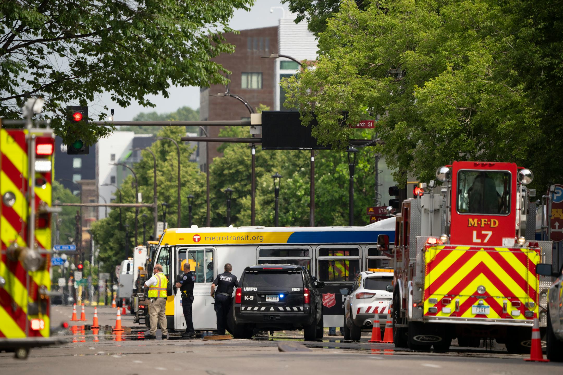 Emergency personnel on a closed University Ave. Thursday afternoon in Minneapolis. A suspected gas leak resulted in the evacuation of fraternity houses on University Ave. SE across from the U of M campus.