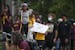 Gophers student athletes rallied outside Morrill Hall to protest against plans to cut four men's sports from the school's athletic program.