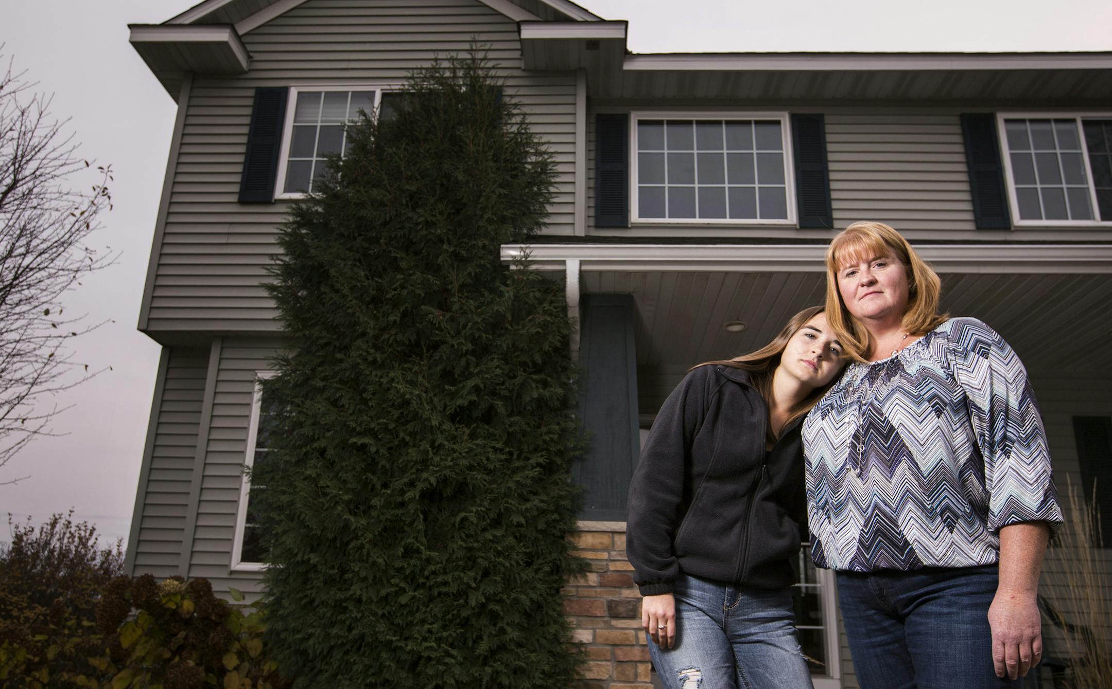 B.J. Gugat of Farmington, with daughter Miranda, 17, has an uphill battle to downsize.