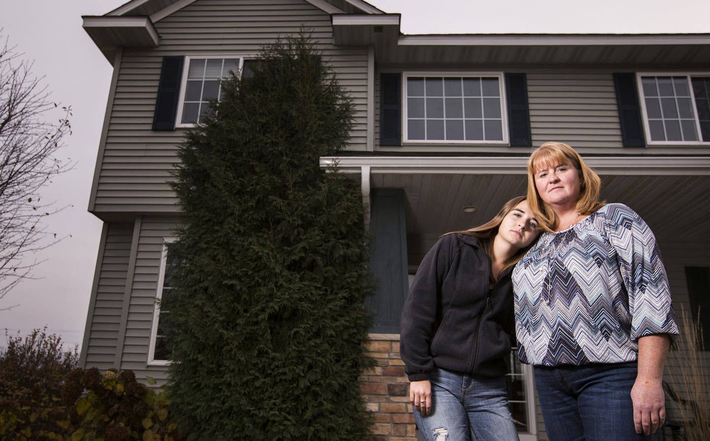 B.J. Gugat of Farmington, with daughter Miranda, 17, has an uphill battle to downsize.