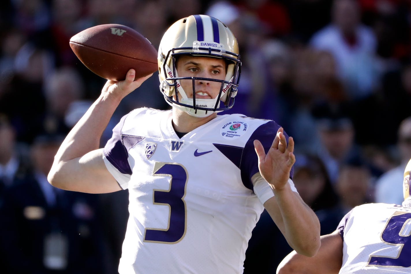 Washington quarterback Jake Browning passes against Ohio State during the first half of the Rose Bowl NCAA college football game Tuesday, Jan. 1, 2019, in Pasadena, Calif. (AP Photo/Jae C. Hong)