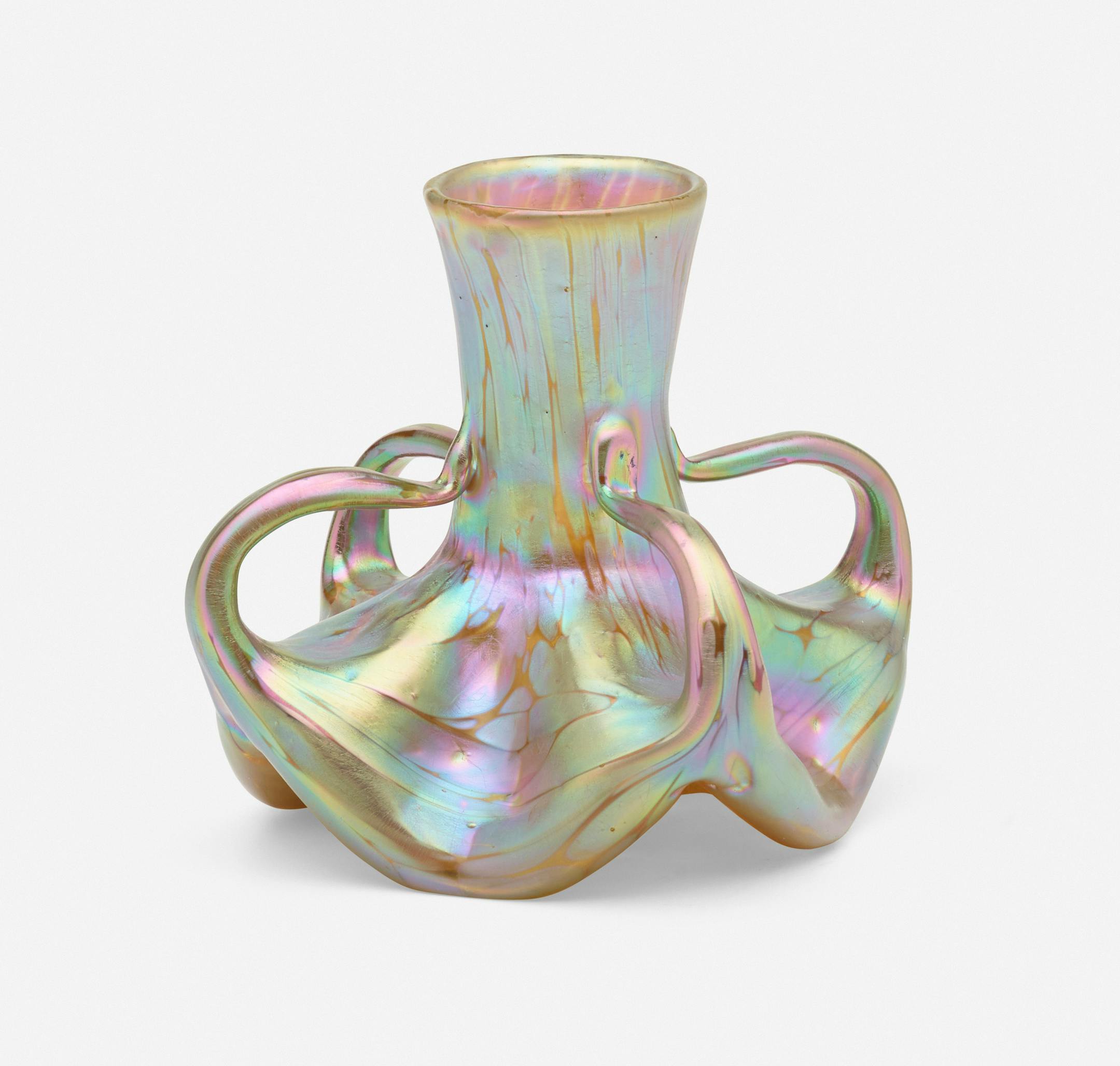 Loetz is one of the most famous European glassmakers of the late 19th to early 20th centuries. This vase is from its popular Phanomen line.