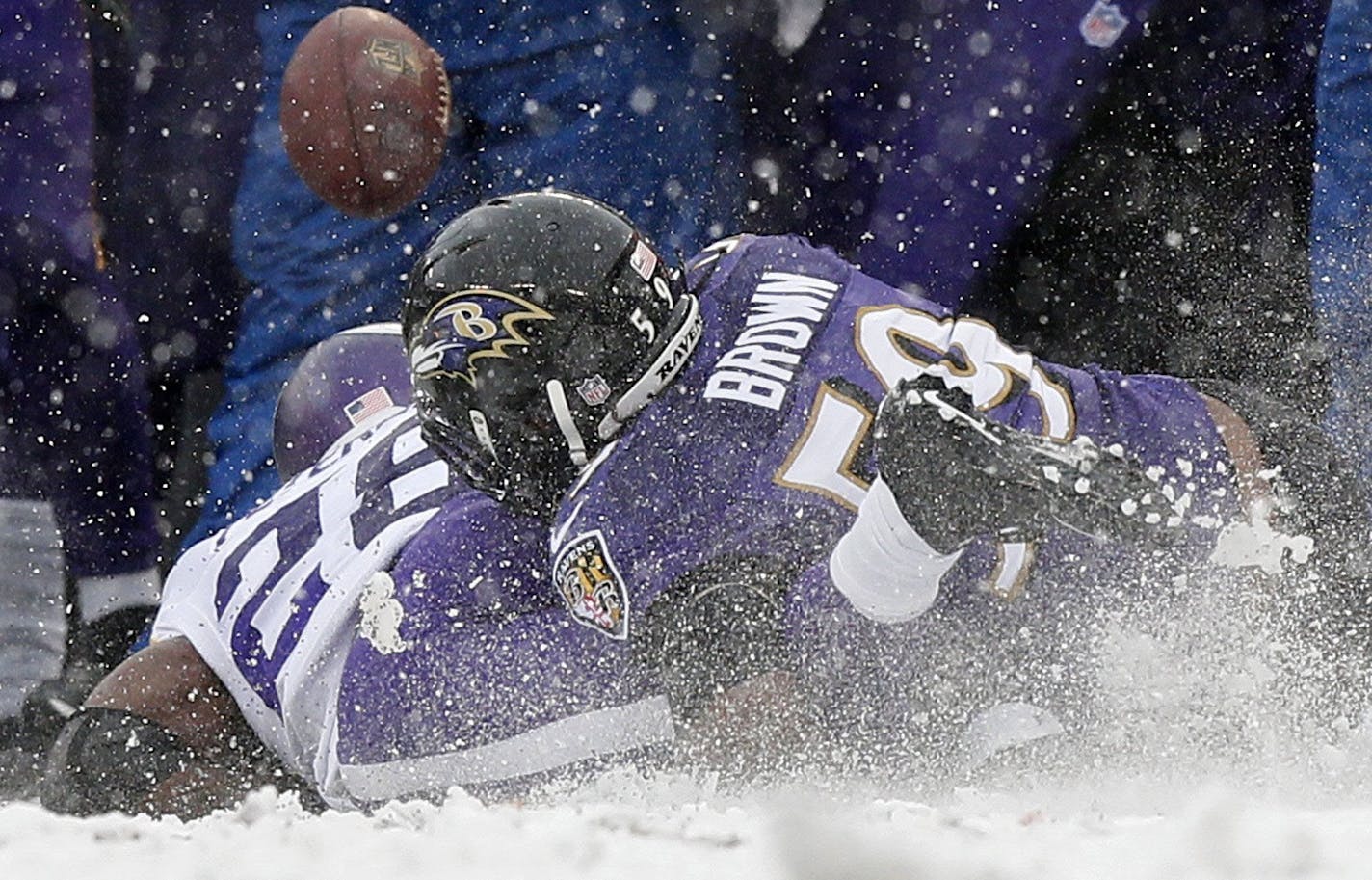 Vikings Adrian Peterson is hit hard and hurts his ankle in the second quarter as the Minnesota Vikings face the Baltimore Ravens at M&T Bank Stadium, Sunday, Dec. 8, 2013 in Baltimore, MD. (Brian Peterson/Minneapolis Star Tribune/MCT)