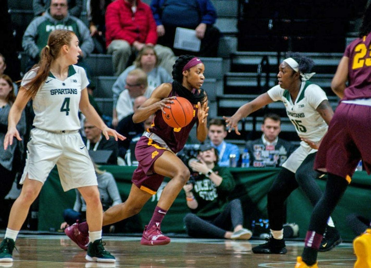 Minnesota's junior forward Taiye Bello (5) drives toward the net during the game against Minnesota on Jan. 9, 2019 at Breslin Center. The Spartans beat the Gophers, 86-68. credit: Sylvia Jarrus / The State News