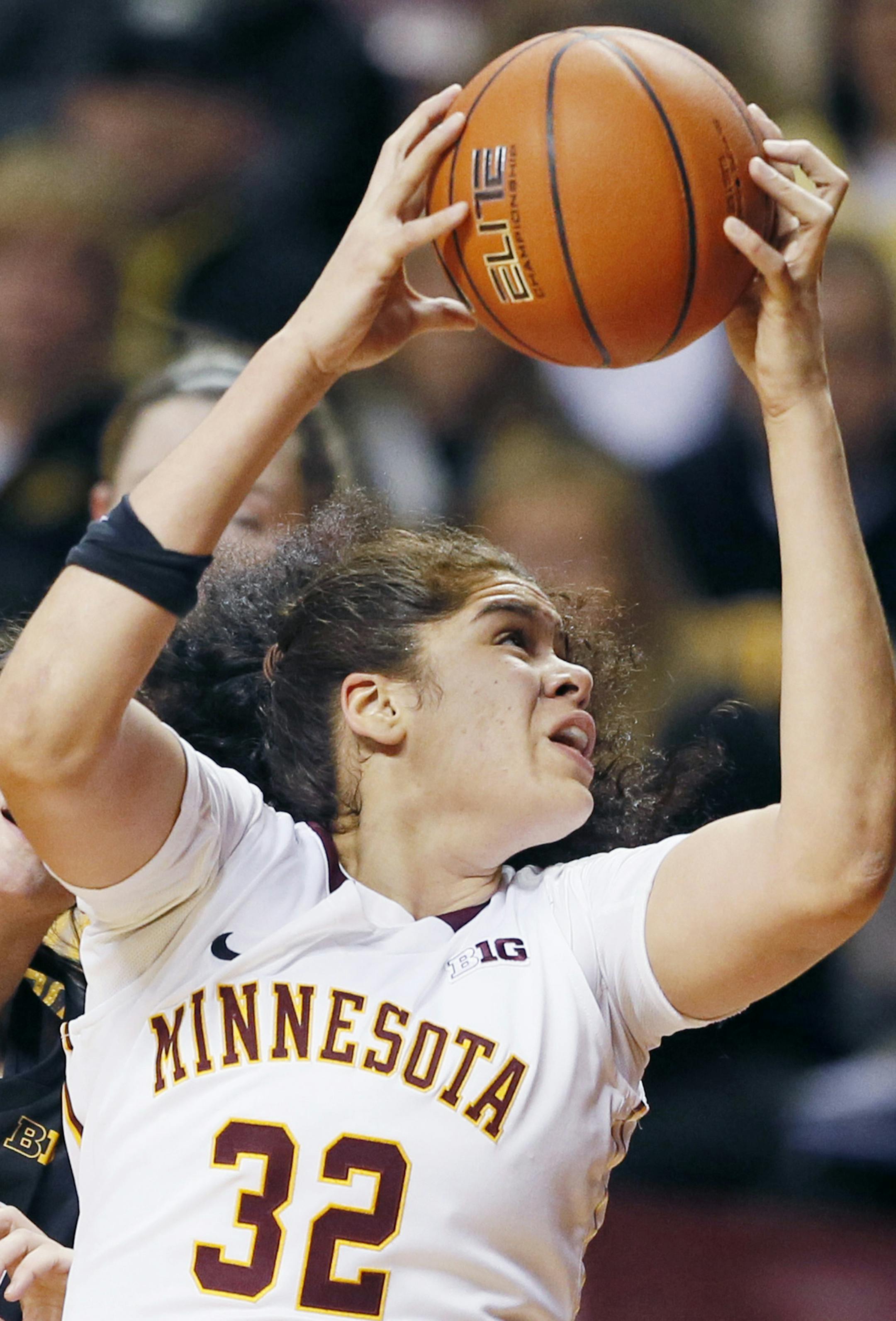 Minnesota Golden Gophers center Amanda Zahui B. (32) pulled down a rebound over Iowa Hawkeyes center Bethany Doolittle (51).Minnesota hosted Iowa at Williams Arena Tuesday February 17, 2015 in Minneapolis MN. ] Jerry Holt/ Jerry.Holt@Startribune.com