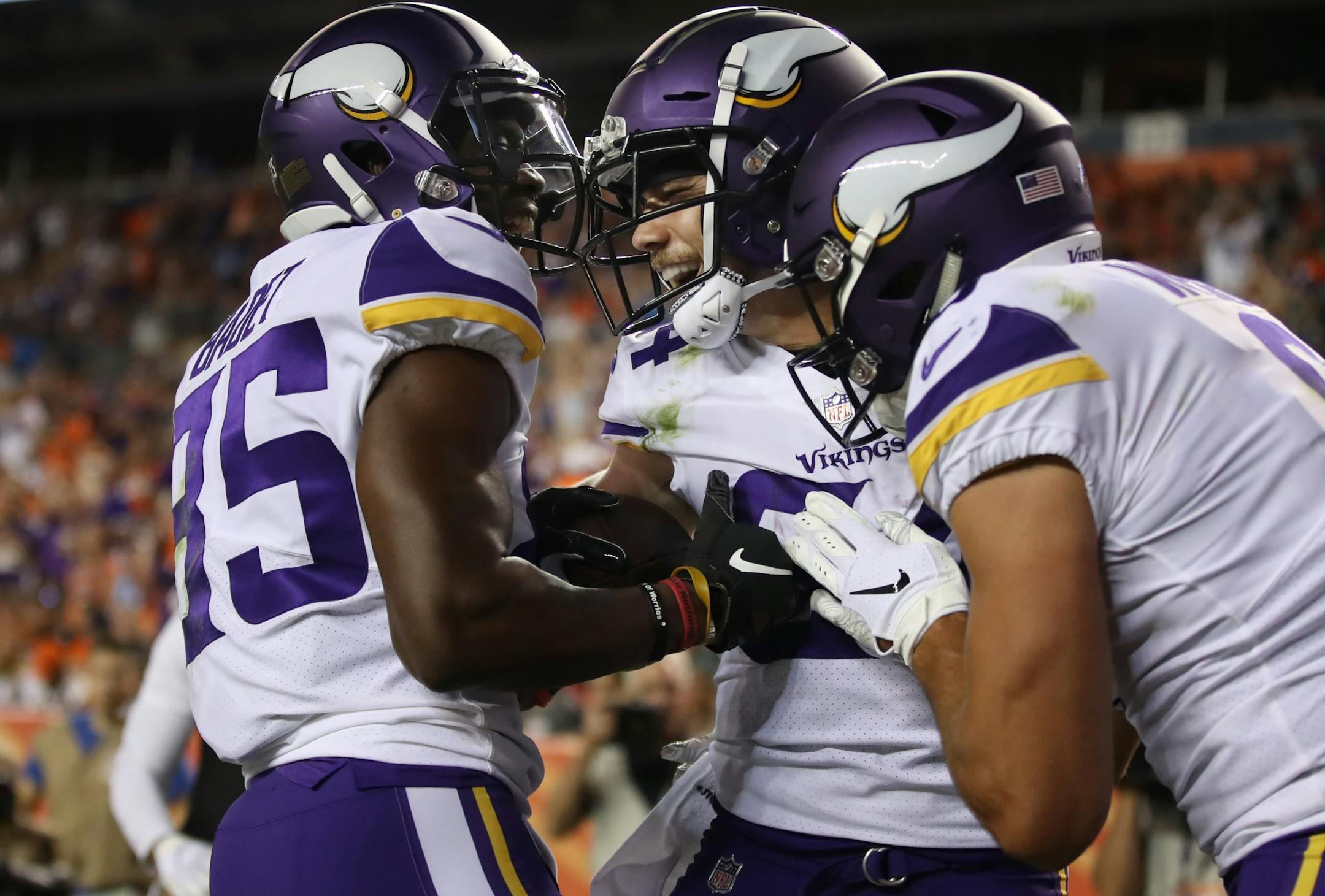 Minnesota Vikings wide receiver Chad Beebe (84) celebrated his forth quarter touchdown catch withJeff Badet (85), and Jake Wieneke (9)Saturday August 11, 2018 at Broncos Stadium at Mile High in Denver, CO.