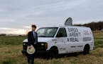 Peter McIndoe, the 23-year-old behind the Birds Aren’t Real movement, with his van in Fayetteville, Ark., on Tuesday, Dec. 7, 2021. In a post-truth 