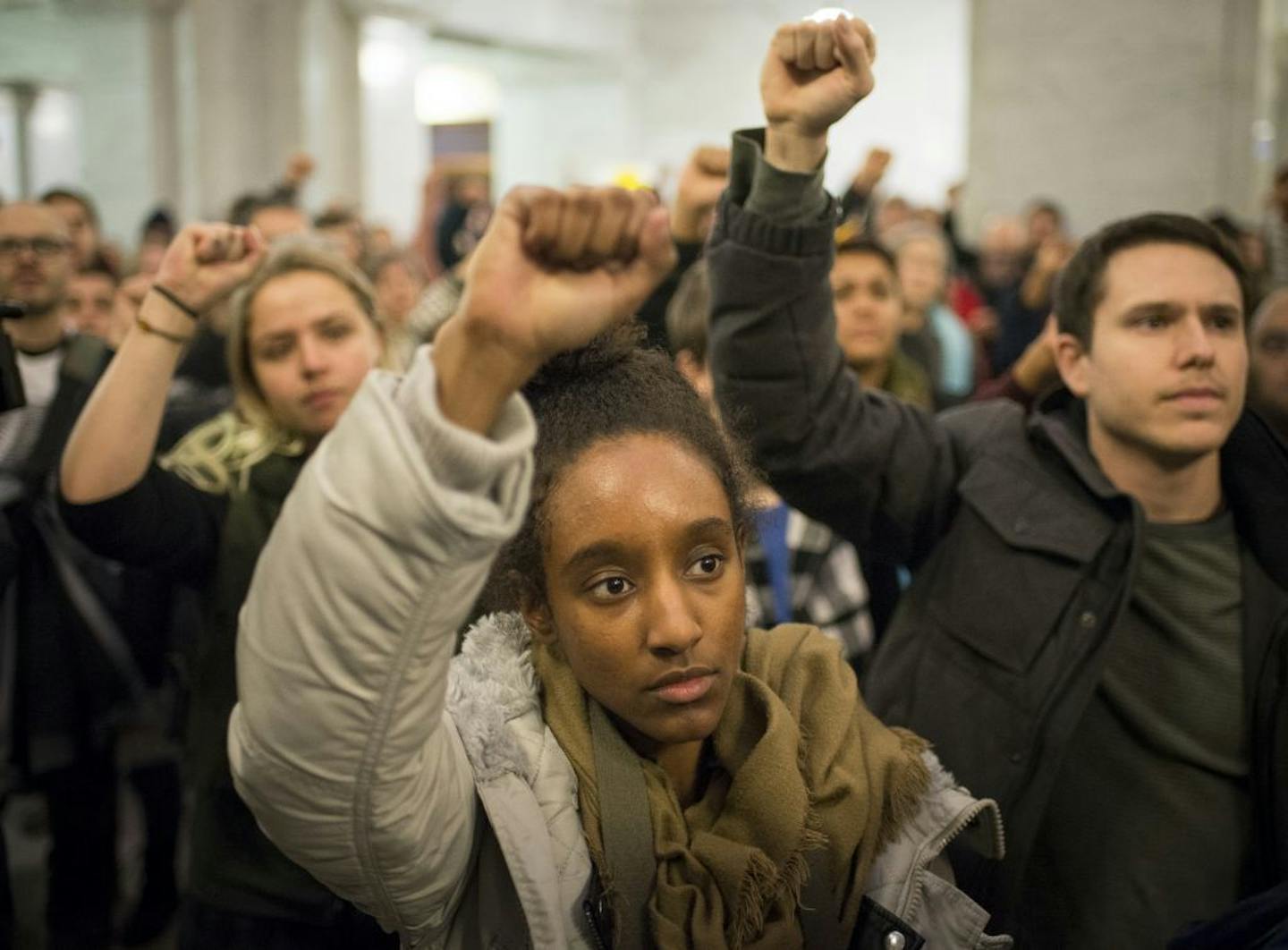 Activist Netsanet Negussie raised her hand in solidarity during Thursday night's protest at Minneapolis City Hall.