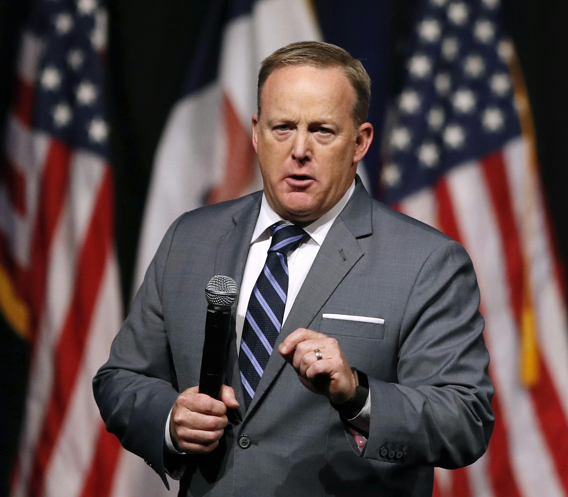 FILE - In this Nov. 8, 2017, file photo, former White House press secretary Sean Spicer speaks during the Republican Party of Iowa's annual Reagan Dinner in Des Moines, Iowa. Spicer is out with a new book reflecting on his time at the podium and working for candidate-turned-President Donald Trump. “The Briefing: Politics, the Press, and the President” offers a rosy picture of Spicer’s former boss and a deeply critical take on the modern White House press corps. (AP Photo/Cha