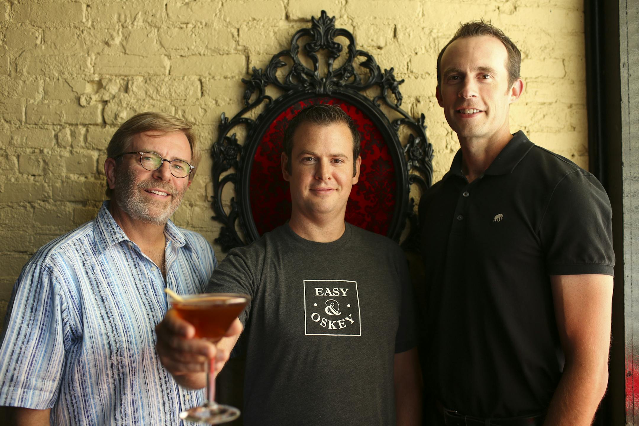 A local design guru and his nephew have teamed up with a St. Paul bartender to produce homemade bitters kits. Riding the craft cocktail wave, locally made bitters have become a trend in the past few years after about a century of obsolescence. Erik Eastman and Dan Oskey ("Easy & Oskey" is their company name), along with Erik's uncle James Eastman talked about their DIY kits at The Strip Club Thursday afternoon, July 18, 2013 on St. Paul's East Side. James Eastman, Dan Oskey, and Erik Eastman, fr