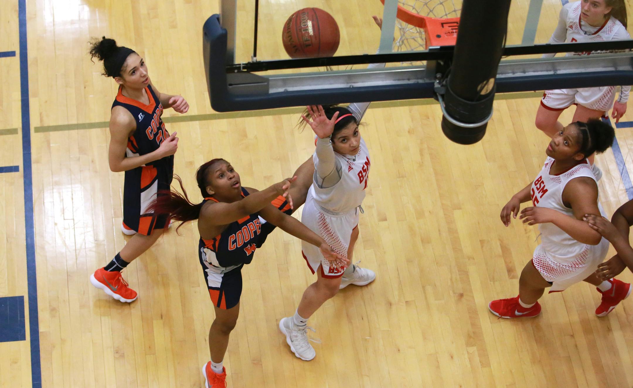 Robbinsdale Cooper guard Ty'neecia Longs goes for a layup during the game against Benilde-St. Margaret's on Thursday, March 8, 2018 at Chanhassen High School. The Robbinsdale Cooper Hawks won 62-47 and will advance to the state tournament next week. [Ellen Schmidt ï ellen.schmidt@startribune.com
