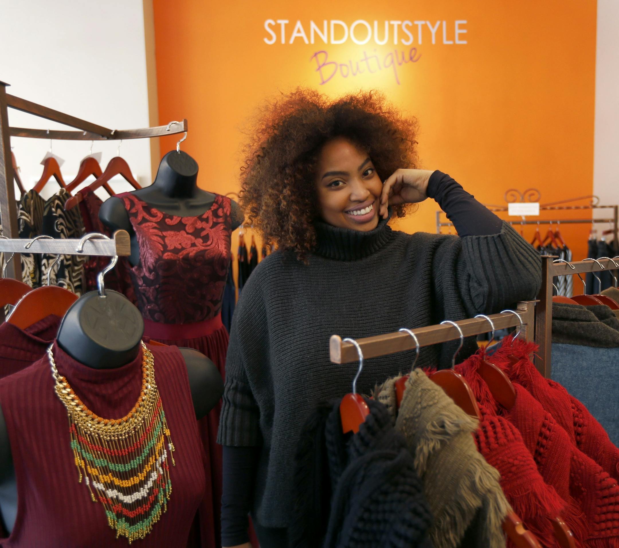In this Wednesday, Jan. 20, 2016, photo, Tamika Maria Price poses for a portrait at her business, Standout Style Boutique, in Chicago's Lakeview neighborhood. A disappointing holiday shopping season has small and independent retailers thinking about how to get customers interested in shopping in 2016. After her holiday sales fell 25 percent compared with a year earlier at the boutique, Price is making plans for a brighter year by doubling her Facebook advertising to establish more of an emotiona