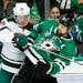 In a February 3, 2018, file image, the Dallas Stars' Jamie Benn (14) tries to break free from the Minnesota Wild's Ryan Suter (20) at the American Air
