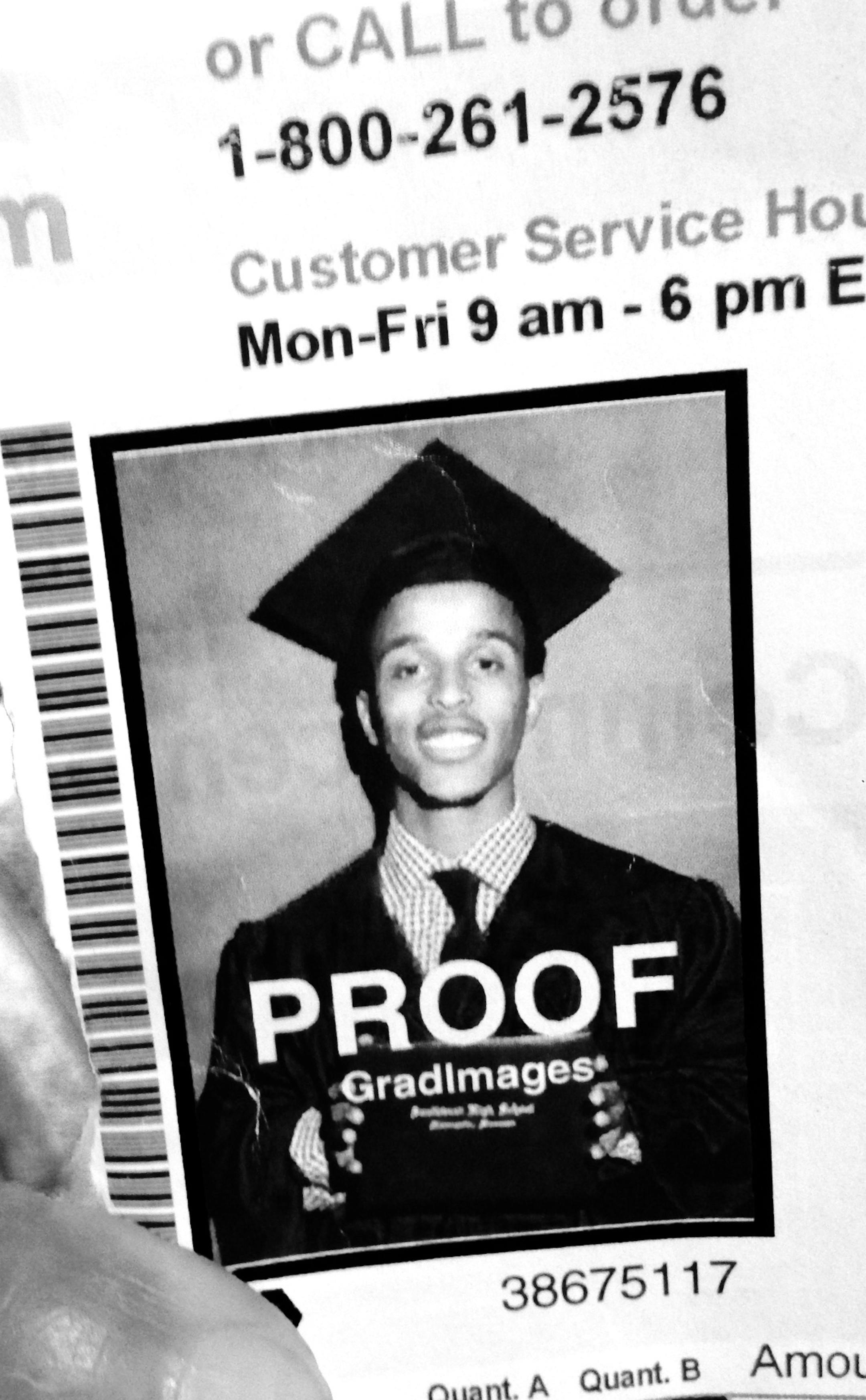 Photo of Abdi Mohamed Nur who graduated from Southwest High School in Minneapolis on June 3, 2013. Photo Randy Furst / Star Tribune 6/4/14 Minneapolis, MN (Randy shot photo of the Mom holding this photo in her hand. )