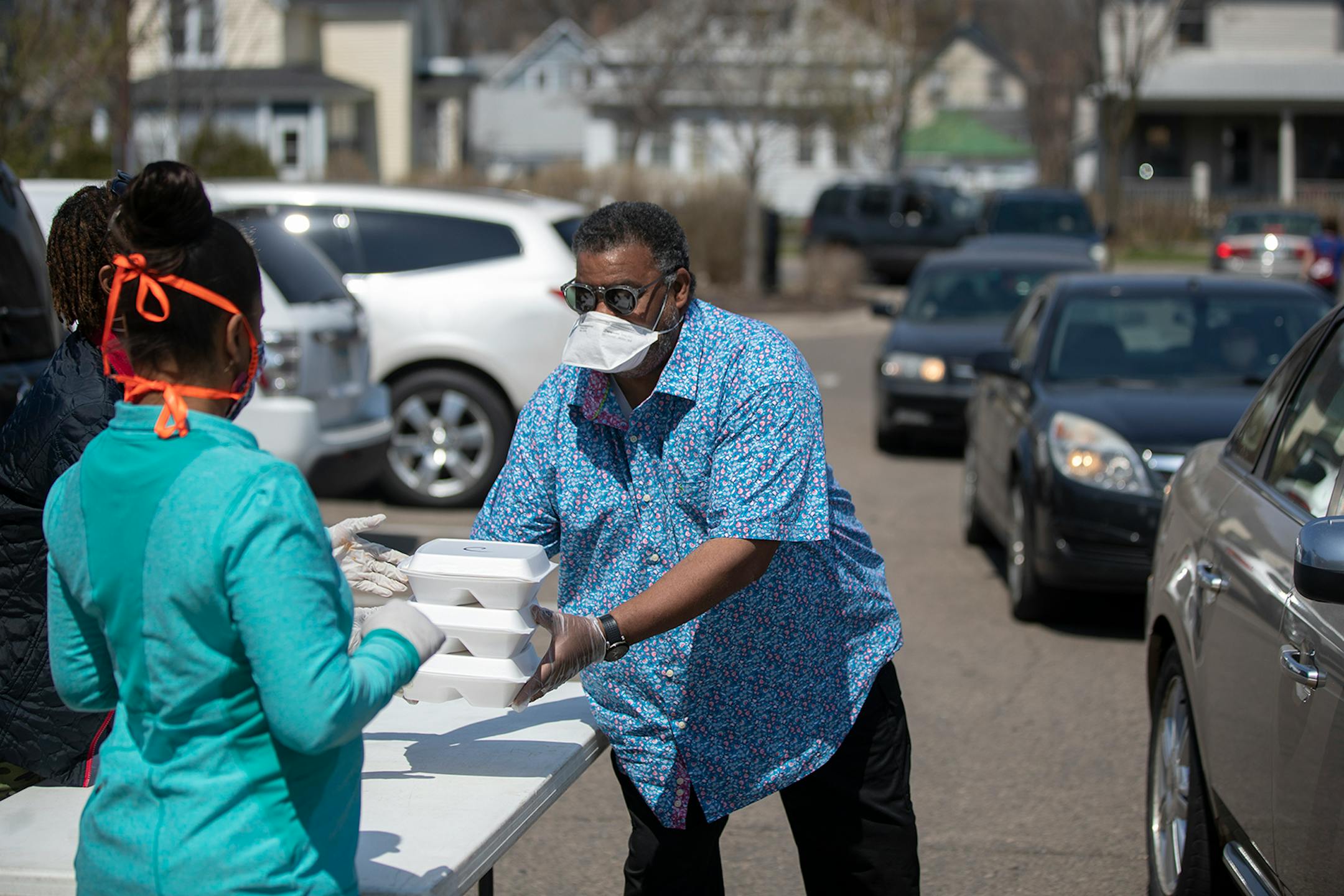 Clarence Castile and his wife Lisa Castile passed out chicken and rib dinner to residents of Frogtown Neighbor. The food was cooked and donated by Los Ocampo restaurant. Los Ocampo gave away 441 free curbside chicken and rib dinner to support their Frogtown neighbors Sunday April 26, 2020 in St. Paul, MN.