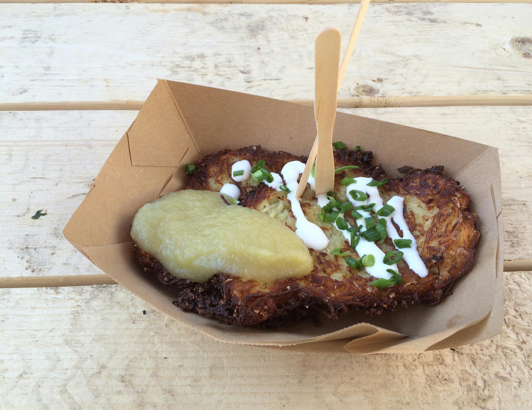 Potato pancakes with apple sauce and sour cream