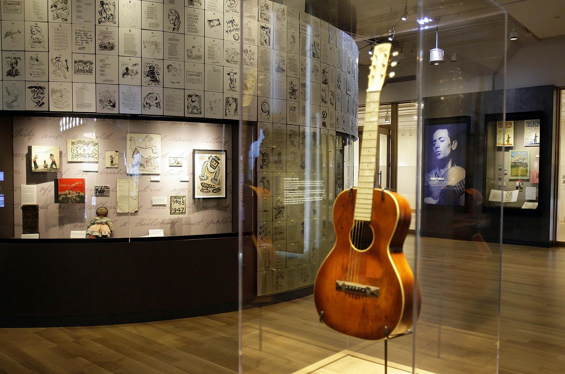 One of several instruments and other items on display at the Woody Guthrie Center the day before it opens to the public at Guthrie Green Friday, April 26, 2013 in Tulsa, Okla. It took Woody Guthrie's hometown of Okemah more than 30 years after his death to finally celebrate his life and work with an annual music festival, and signs of acknowledgment in other parts of Oklahoma have been rare. The Woody Guthrie Center opens Saturday in Tulsa, it won't mark some uneasy truce between Oklahoma and th