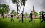 The 133rd National Guard Base Honor Guard retired the colors as the ceremony concluded. ] GLEN STUBBE * gstubbe@startribune.com , Monday, May 25, 2015