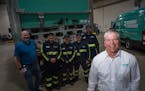Restaurant Technologies CEO Jeff Keisel stands in front of depot employees who deliver and help clean 32,000 commercial kitchens nationally, and recyc
