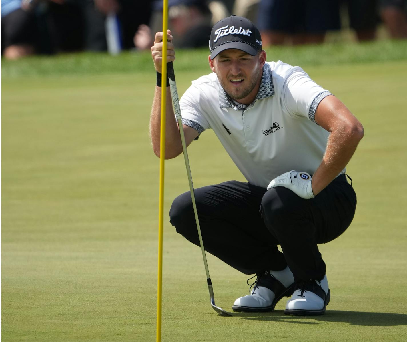 Lee Hodges measures his putt on the 8th hole in Blaine, Minn., on Sunday, July 30, 2023.This is the final round of the 3M Open at the TPC Twin Cities.] RICHARD TSONG-TAATARII • richard.tsong-taatarii @startribune.com