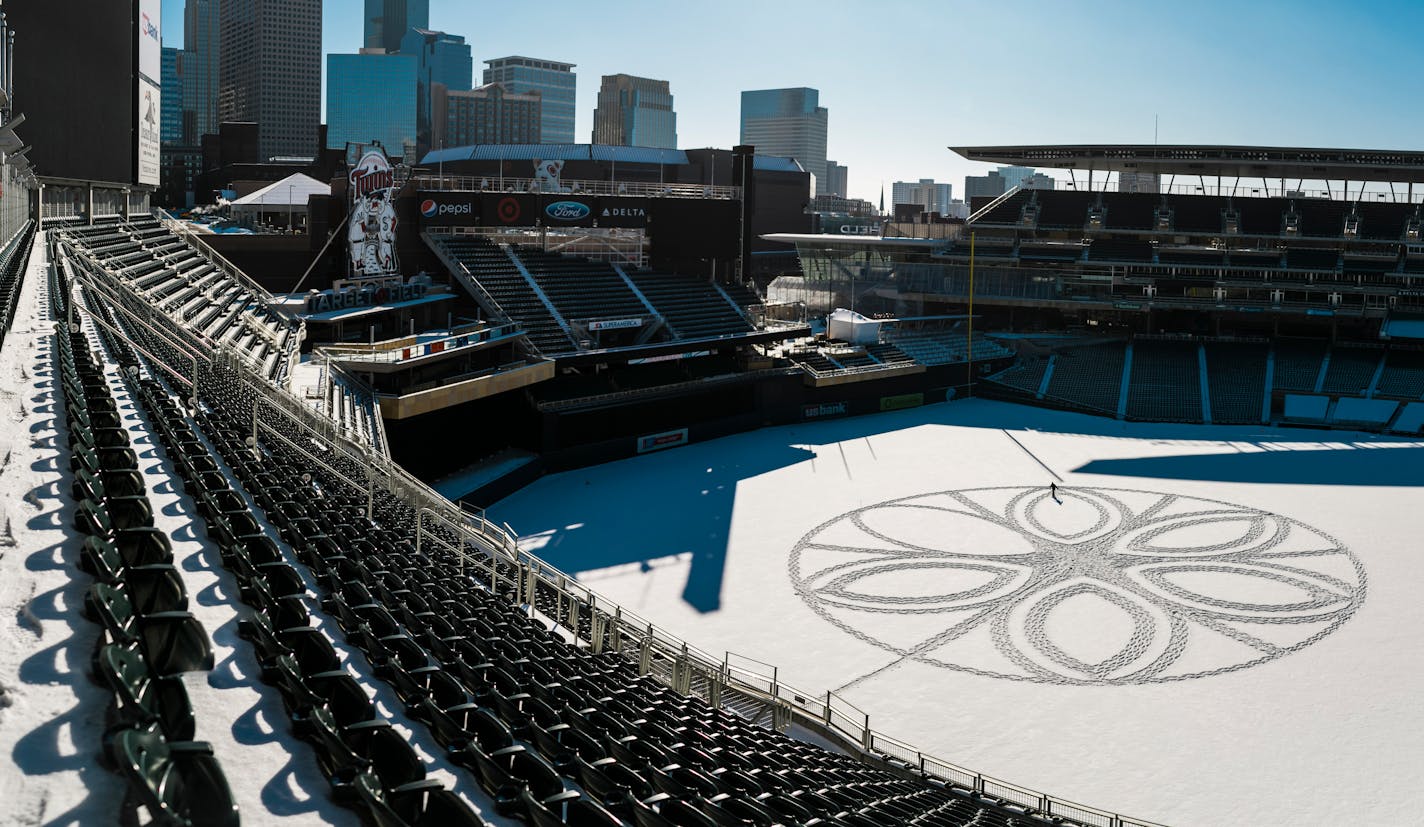 Simon Beck created a huge snow design with his snowshoes.