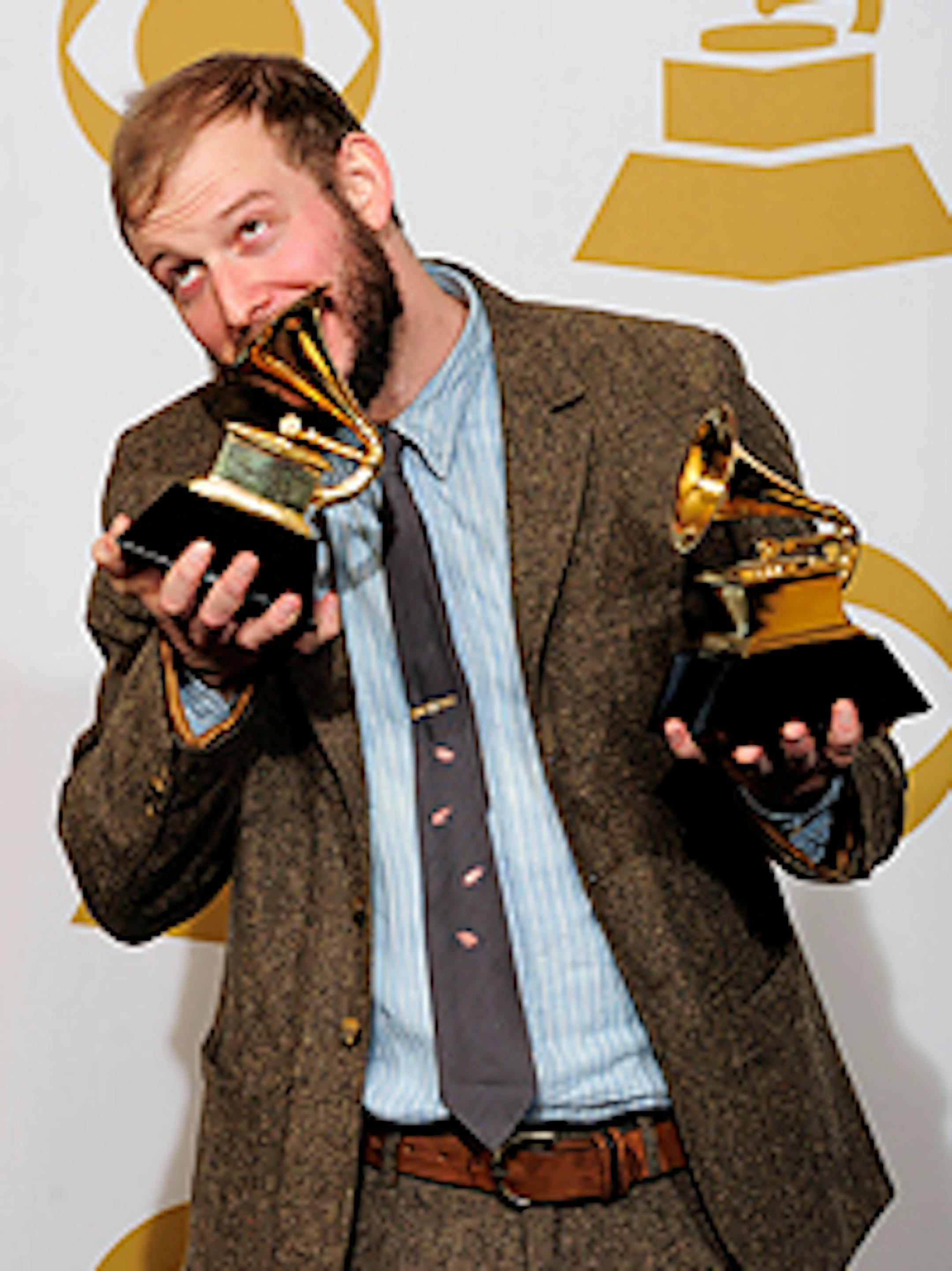 Justin Vernon, of Bon Iver, posing backstage after winnig the award for best alternative music album