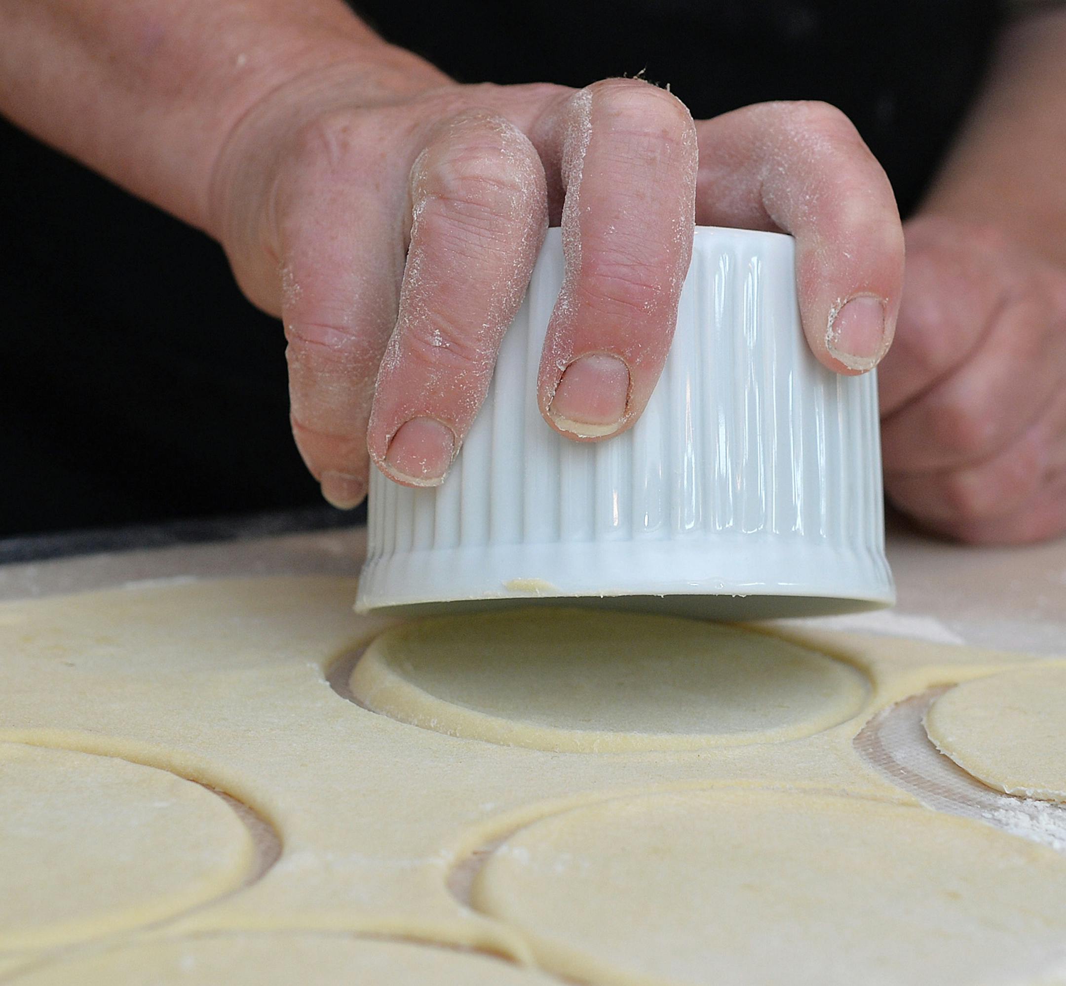 Use a round stencil to stamp dough into circles. ] (SPECIAL TO THE STAR TRIBUNE/BRE McGEE)