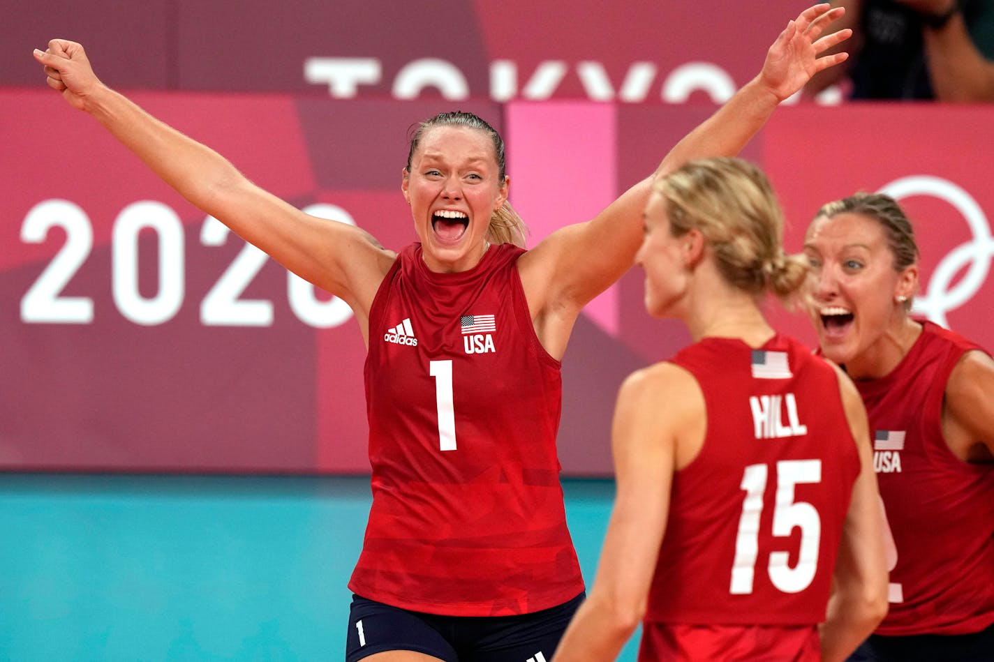 United States' Micha Hancock celebrates with teammates winning the women's volleyball preliminary round pool B match between United States and Italy at the 2020 Summer Olympics, Monday, Aug. 2, 2021, in Tokyo, Japan. (AP Photo/Frank Augstein)