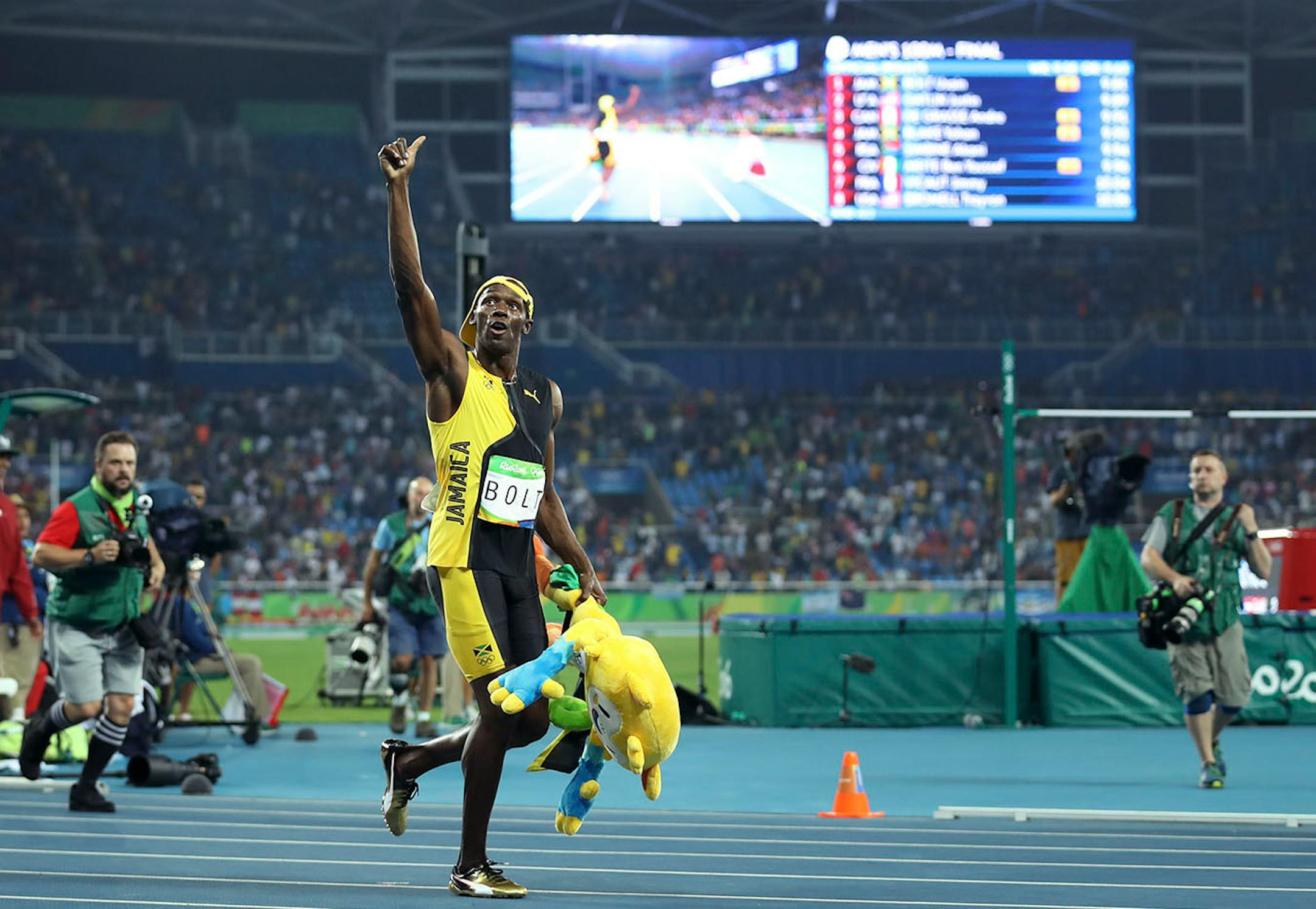 Men's 100 meter final. Jamaica's Usain Bolt, wins gold again beating USA's Justin Gatlin.