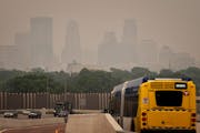 A smoky haze enveloped Minneapolis on June 14, seen from the south across I-35W. 