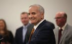 Gov. Mark Dayton smiled as he answered questions from the media about the bid to bring the 2020 college football championship to Minneapolis.