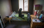 A young sex-trafficking victim sat in her room between classes at the Link's Passageways Shelter and Housing Program, Friday, May 26, 2017 in Prior La