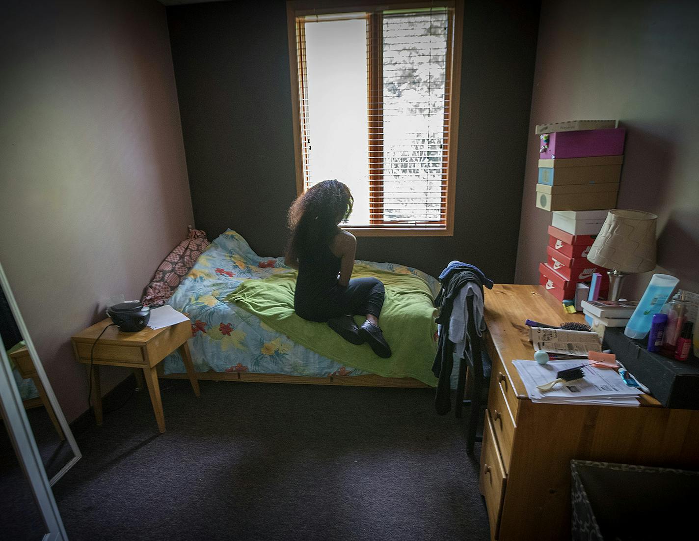 A young sex-trafficking victim sat in her room between classes at the Link's Passageways Shelter and Housing Program, Friday, May 26, 2017 in Prior Lake, MN. ] ELIZABETH FLORES &#xef; liz.flores@startribune.com