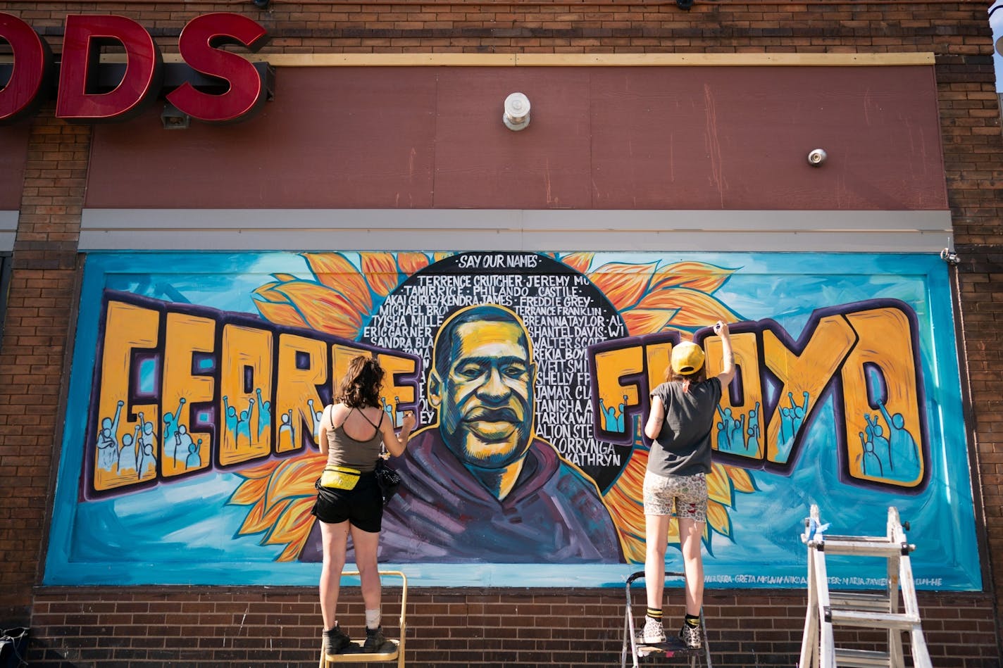 Artists completed a mural of George Floyd outside of Cup Foods where Minneapolis police restrained the unarmed black man.