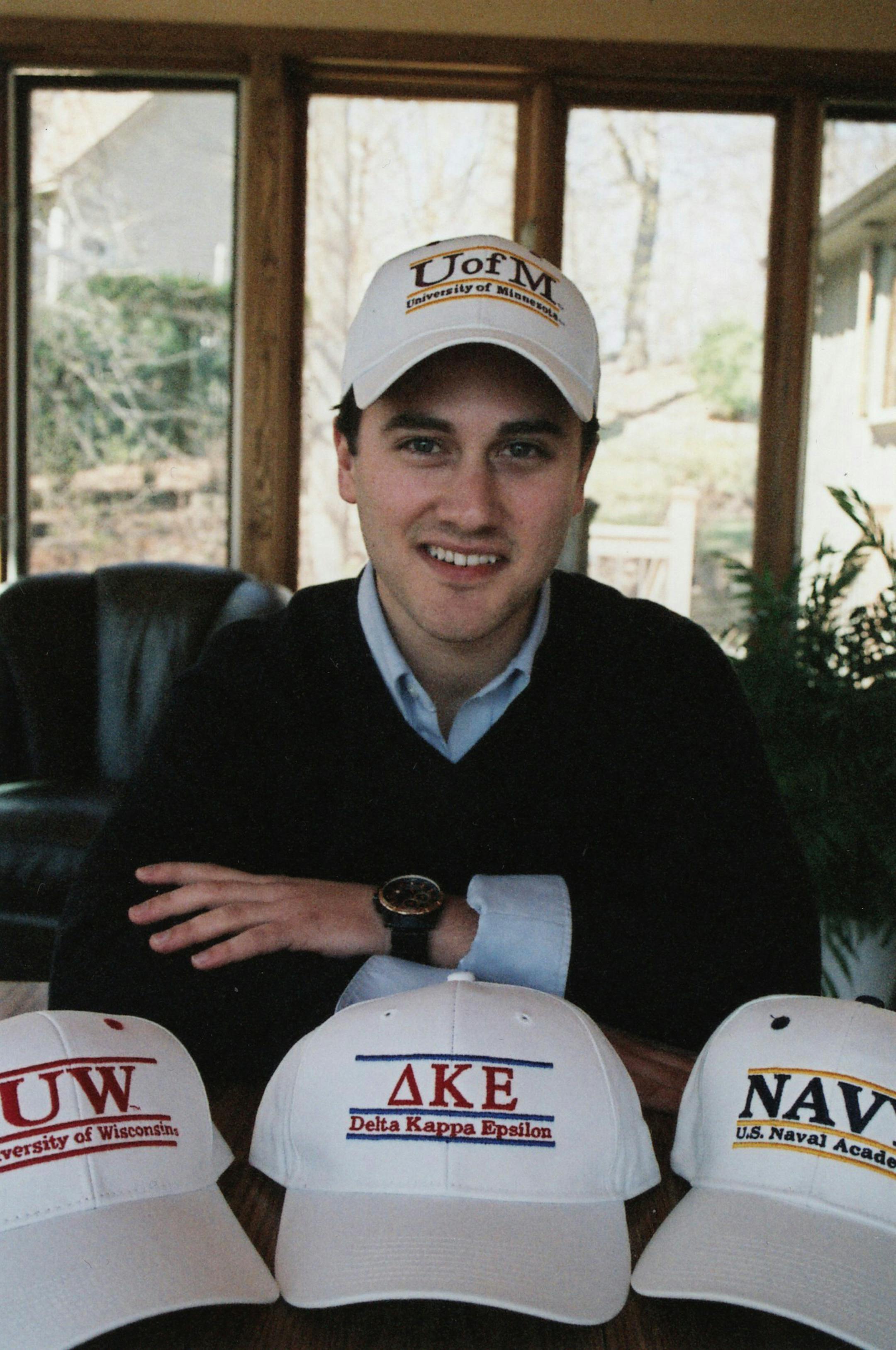 Andrew Ferenci models one of the caps offered online by The College Shack, an online company he co-founded with a childhood friend.