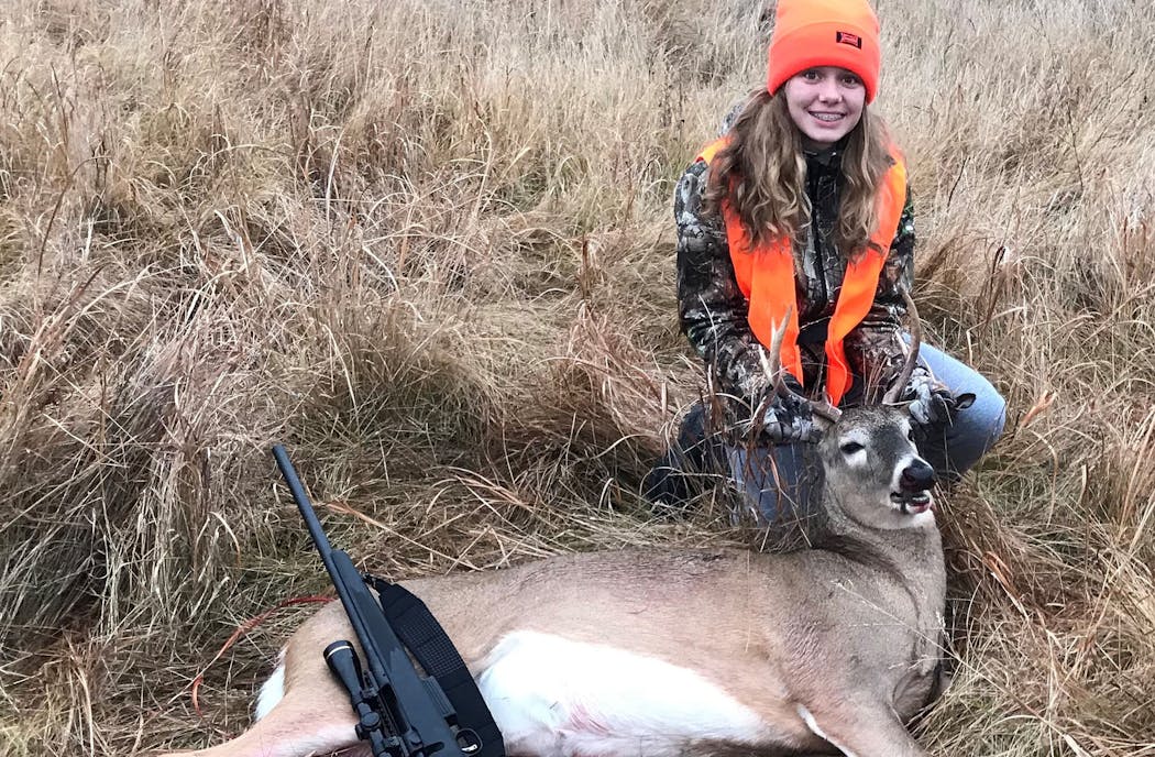 Mallory Appel, 13, of Wheaton, Minn., shot this 7-point buck with a shotgun early Saturday morning near her home.