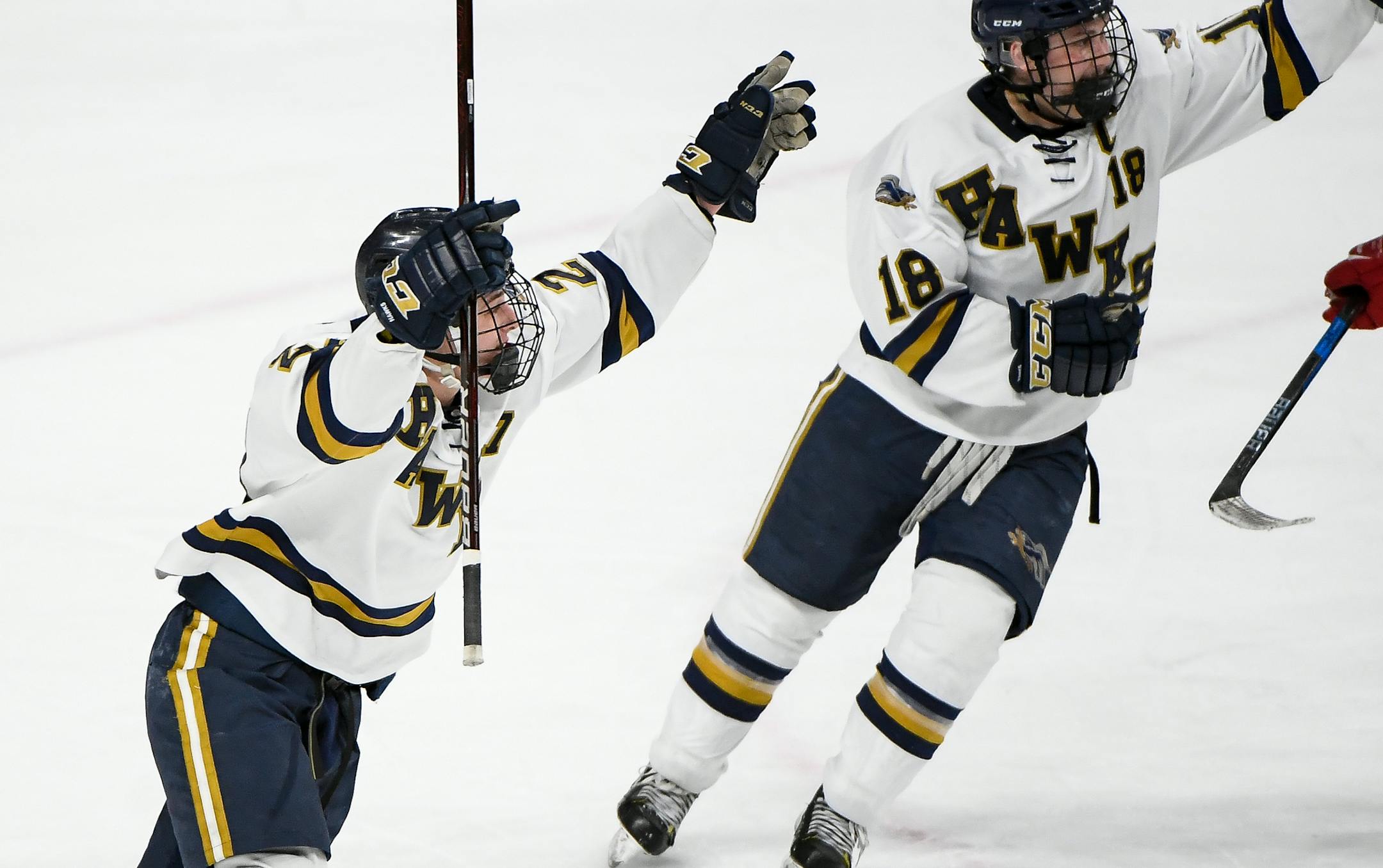 Hermantown wing Blake Biondi (27) and center Tyler Watkins (18) celebrated after Biondi completed a hat trick late in the third period against Monticello. ] AARON LAVINSKY ï aaron.lavinsky@startribune.com Monticello played Hermantown in the Class 1A boys' hockey quarterfinals on Wednesday, March 7, 2018 at the Xcel Energy Center in St. Paul, Minn.