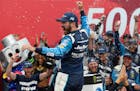 Martin Truex Jr. celebrated in Victory Lane after winning the Bank of America 500 at Charlotte Motor Speedway in Concord, N.C., on Sunday.