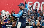 Martin Truex Jr. celebrated in Victory Lane after winning the Bank of America 500 at Charlotte Motor Speedway in Concord, N.C., on Sunday.